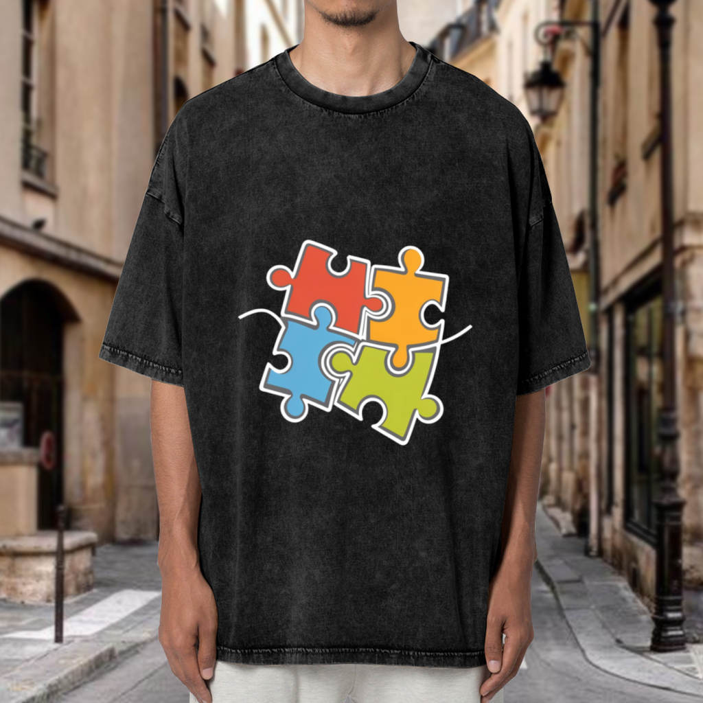 Product image of washed graphic T-shirt featuring 'Autism Awareness' statement design