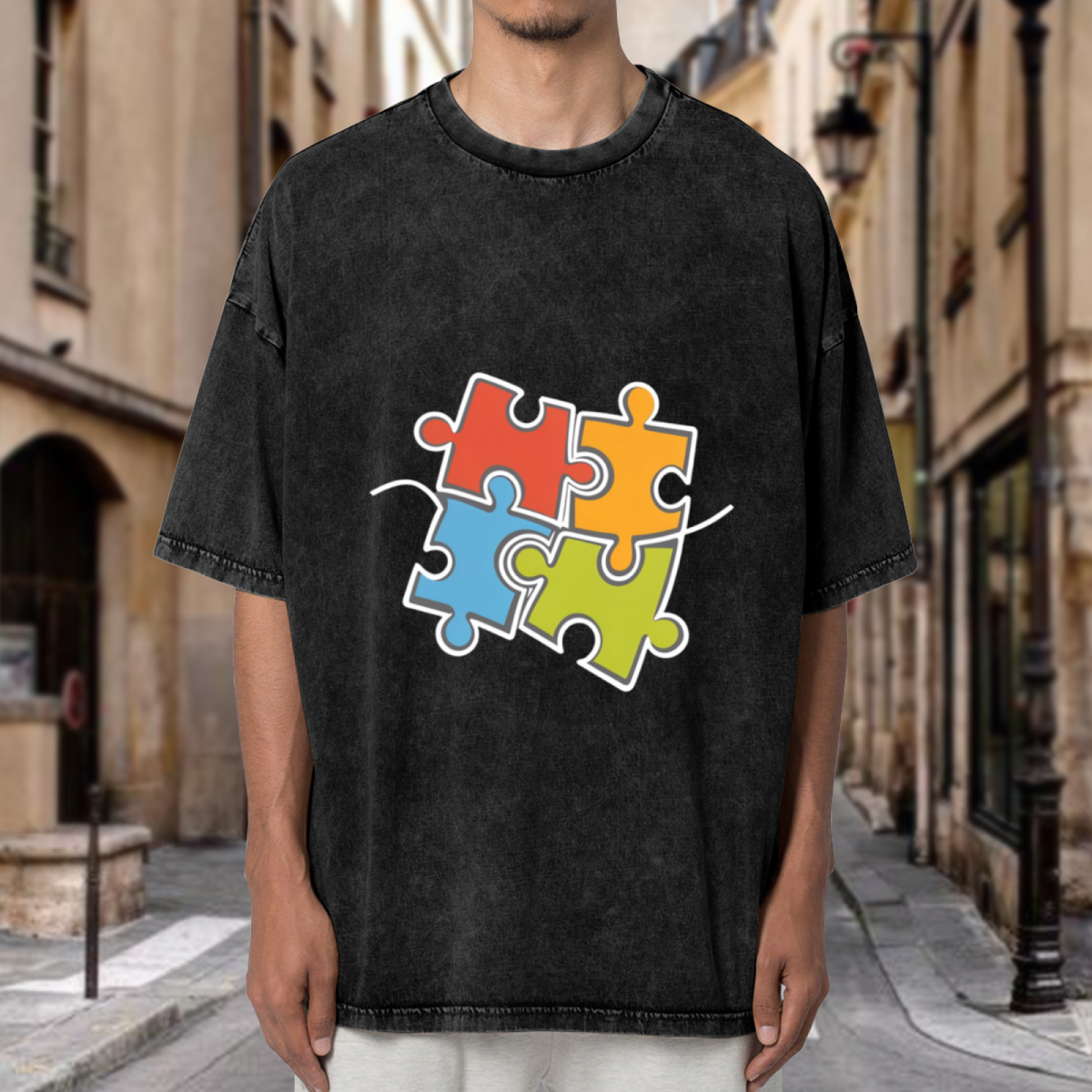 Product image of washed graphic T-shirt featuring 'Autism Awareness' statement design