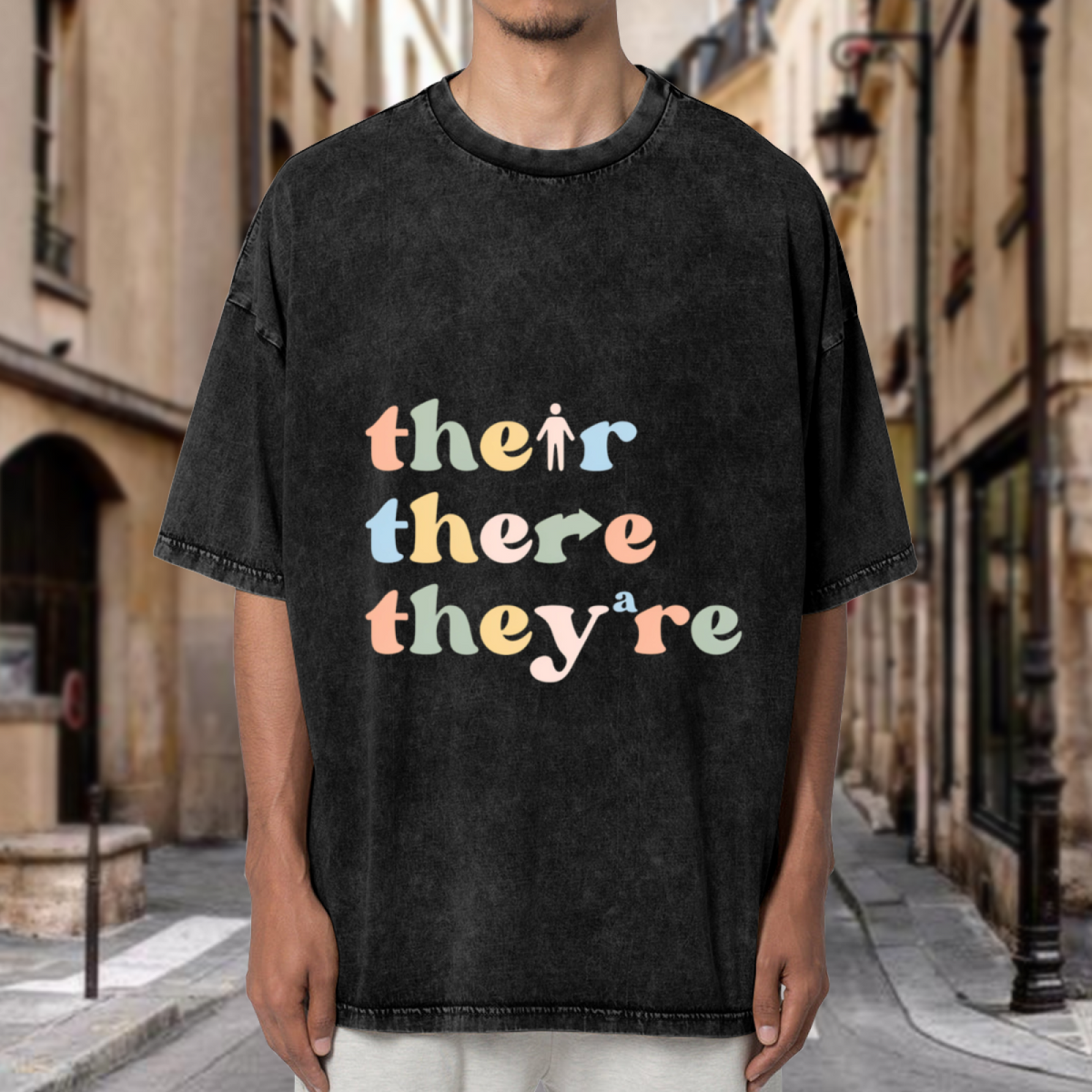 Unisex washed graphic T-shirt with Their There They’re Grammar themed design, product image