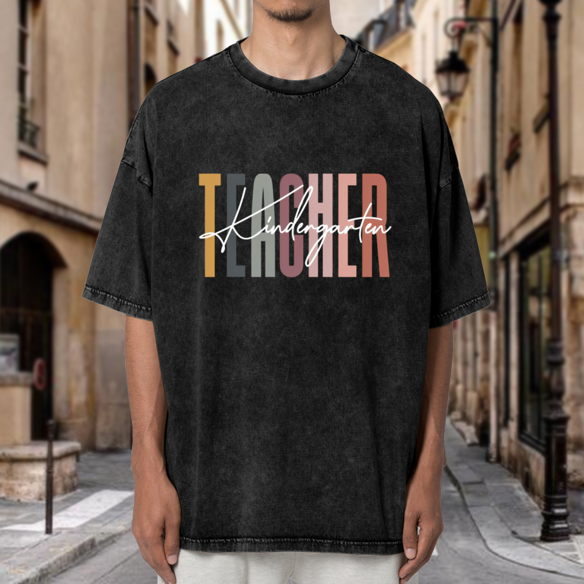 Unisex washed graphic T-shirt with Kindergarten Teacher themed design, product image