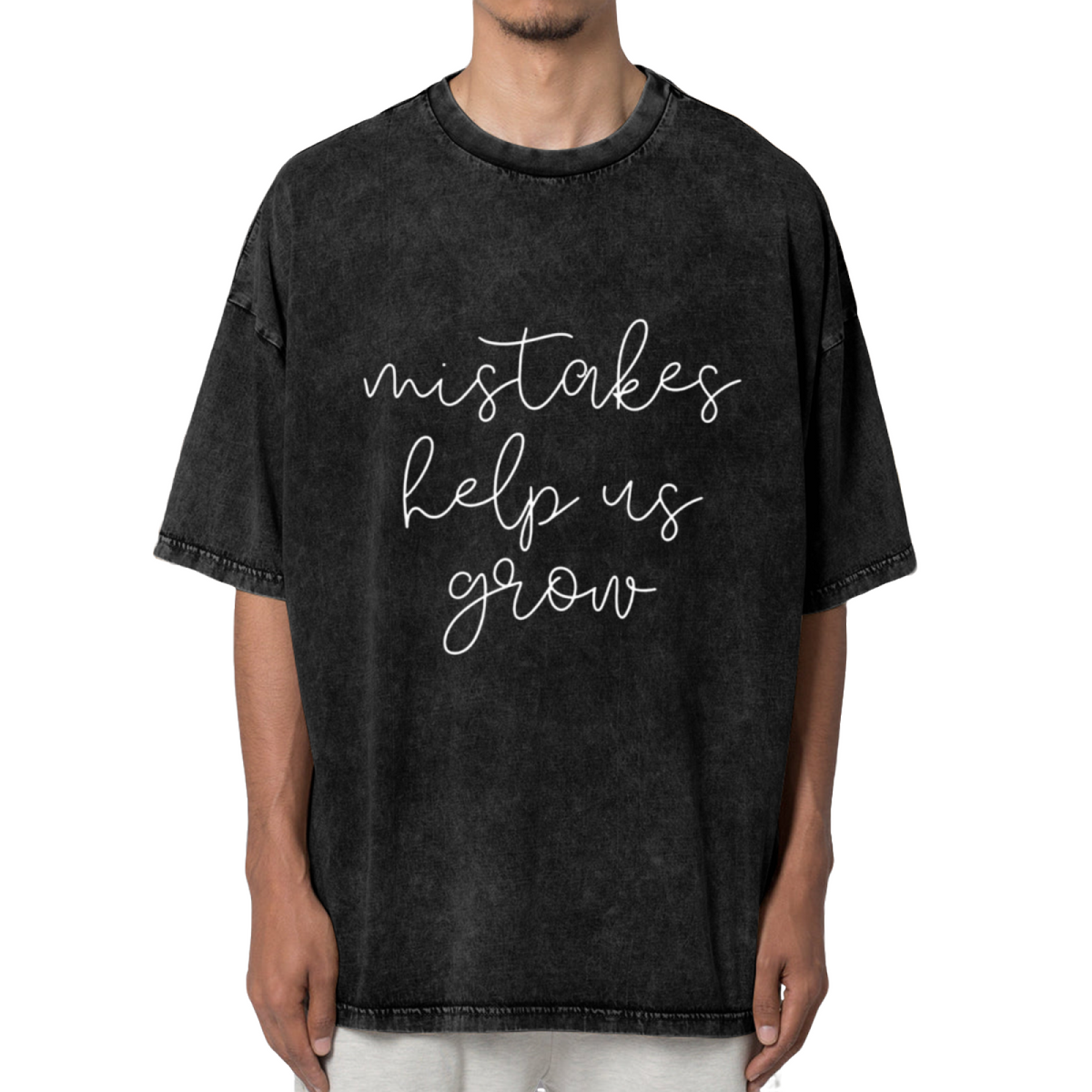 Product image of washed graphic T-shirt featuring 'Mistakes Help Us Grow' statement design