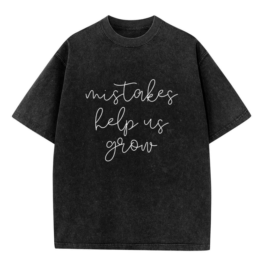 Product image of washed graphic T-shirt featuring 'Mistakes Help Us Grow' statement design