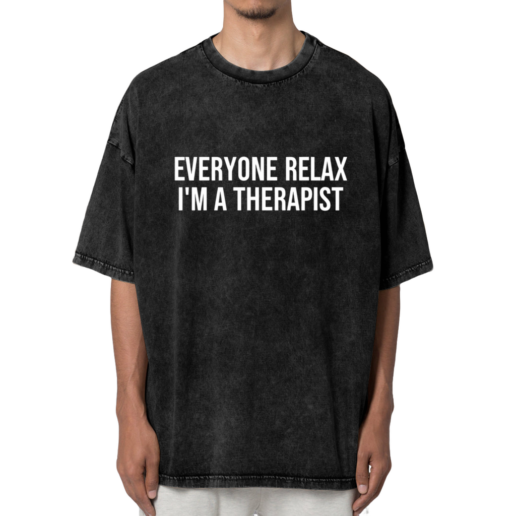 Product image of washed graphic T-shirt featuring 'Everyone Relax I'm a Therapist' statement design
