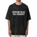 Product image of washed graphic T-shirt featuring 'Everyone Relax I'm a Therapist' statement design
