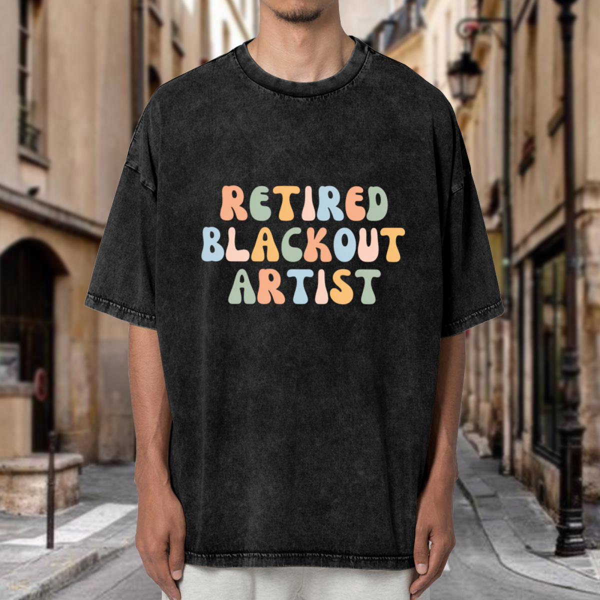 Unisex washed graphic T-shirt with Retired Blackout Artist themed design, product image