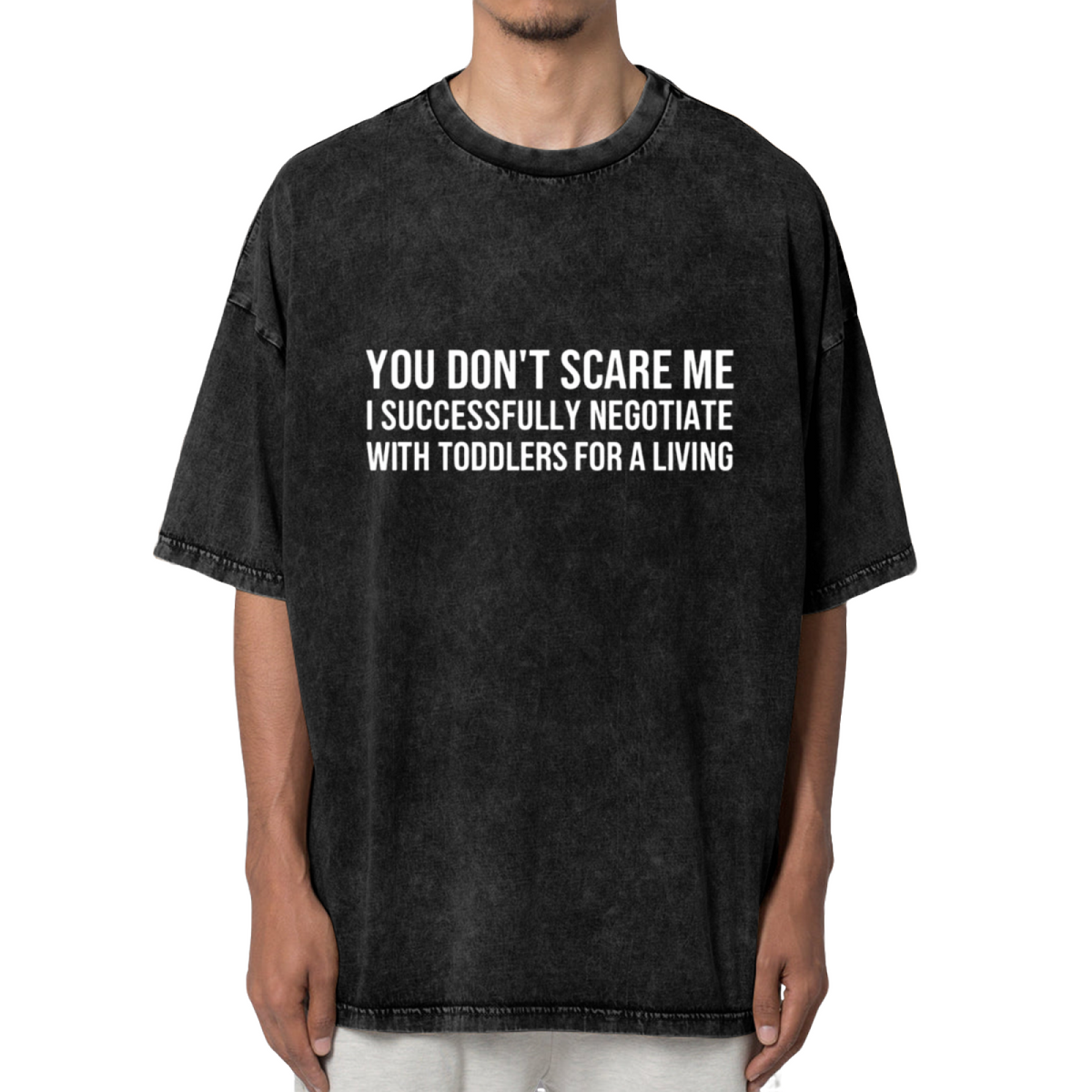 Unisex washed graphic T-shirt with You Don't Scare Me I Successfully Negotiate With Toddlers For A Living themed design, product image