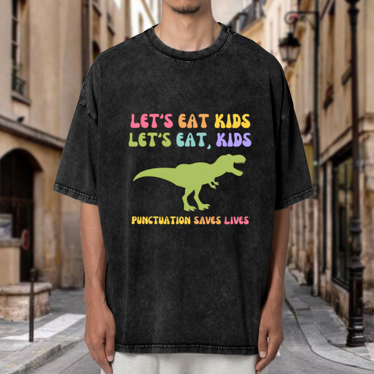 Unisex washed graphic T-shirt with Let's Eat Kids Punctuation Saves Lives themed design, product image