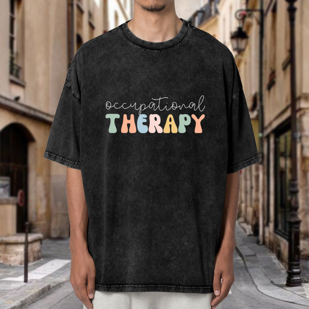 Product image of washed graphic T-shirt featuring 'Occupational Therapy Graphic' statement design