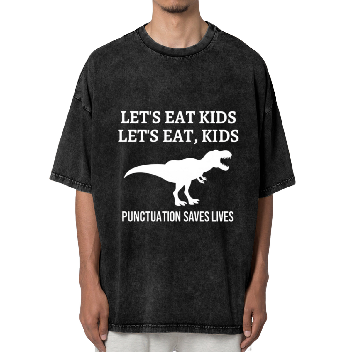 Unisex washed graphic T-shirt with Let's Eat Kids Punctuation Saves Lives themed design, product image