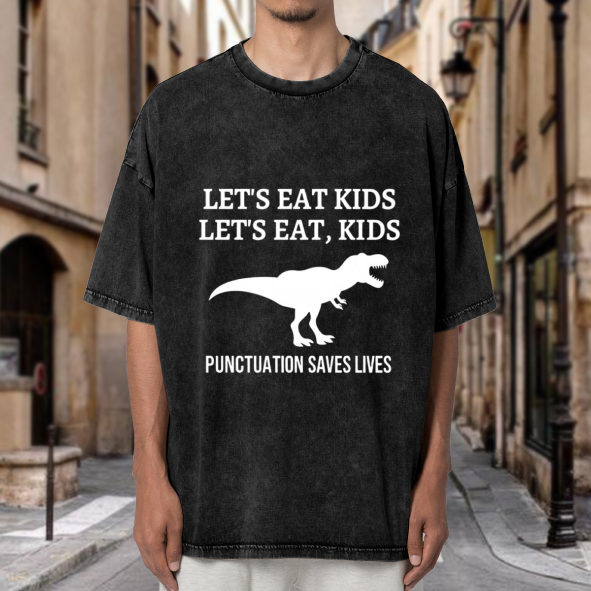 Unisex washed graphic T-shirt with Let's Eat Kids Punctuation Saves Lives themed design, product image