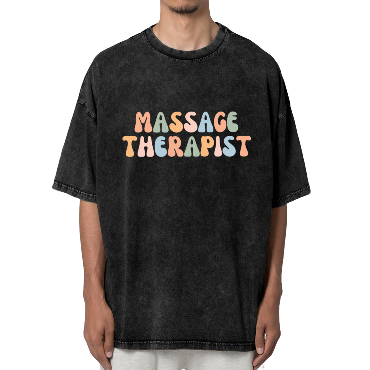 Product image of washed graphic T-shirt featuring 'Massage Therapist' statement design