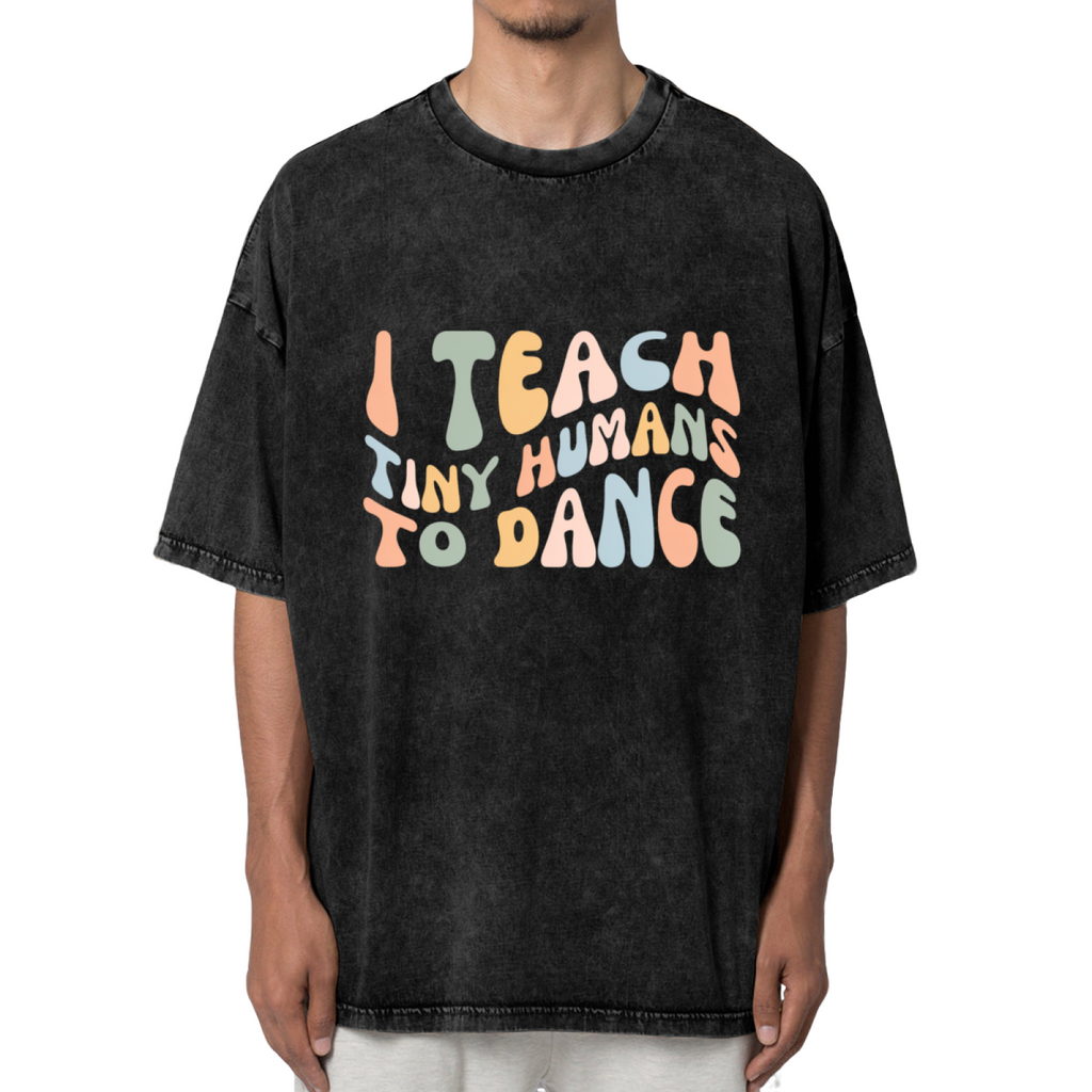 Unisex washed graphic T-shirt with I Teach Tiny Humans To Dance themed design, product image