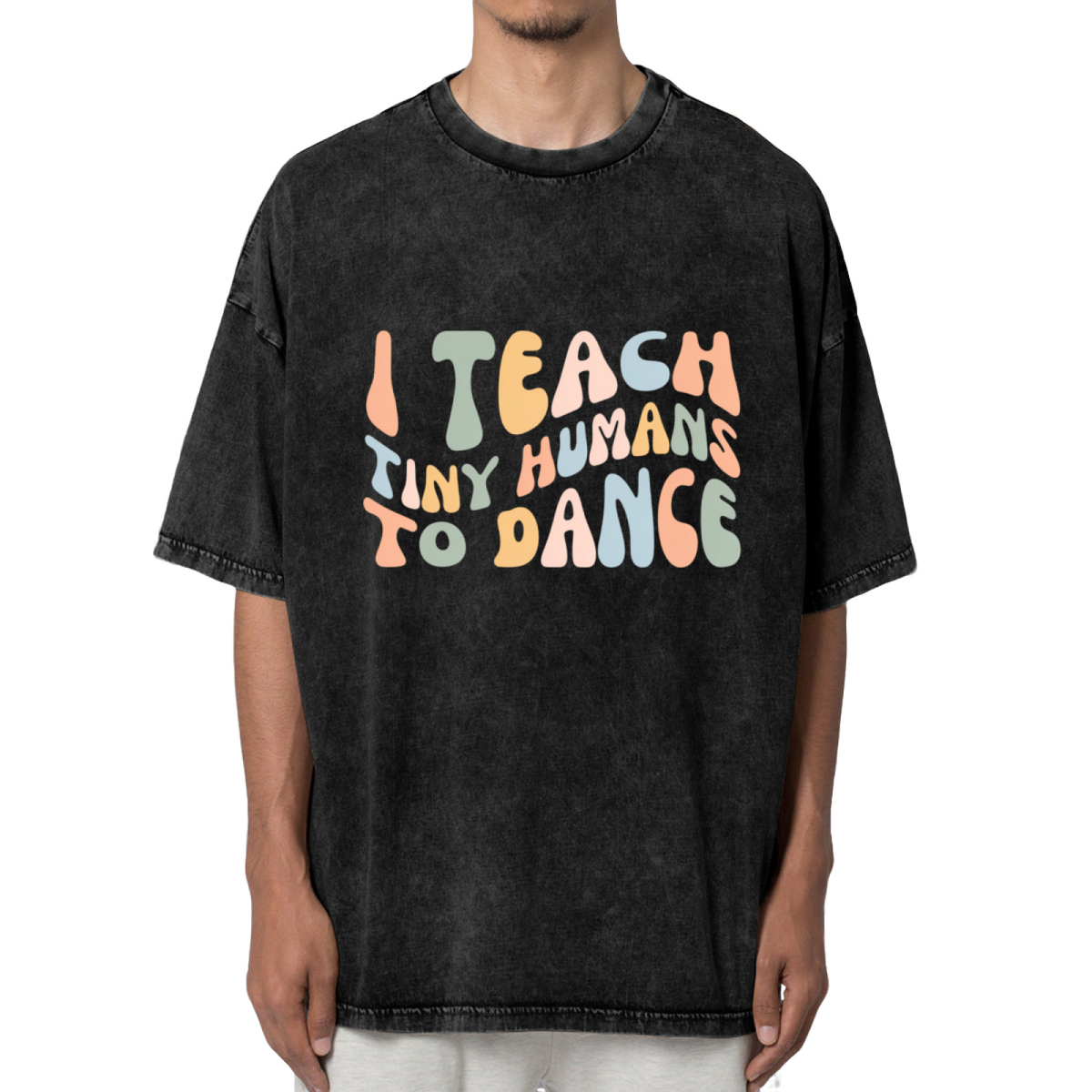 Unisex washed graphic T-shirt with I Teach Tiny Humans To Dance themed design, product image