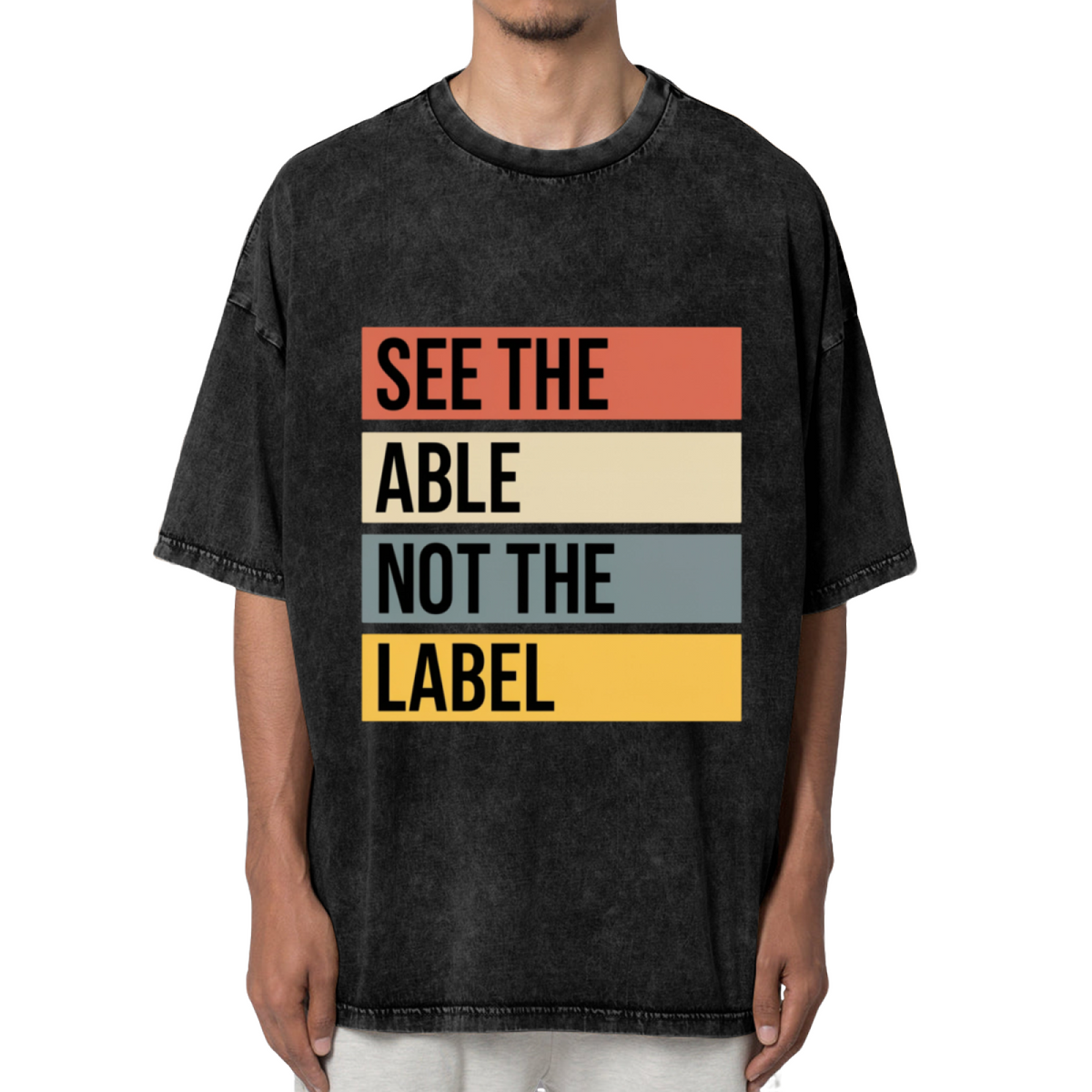 Product image of washed graphic T-shirt featuring 'See the Able Not the Label Autism' statement design