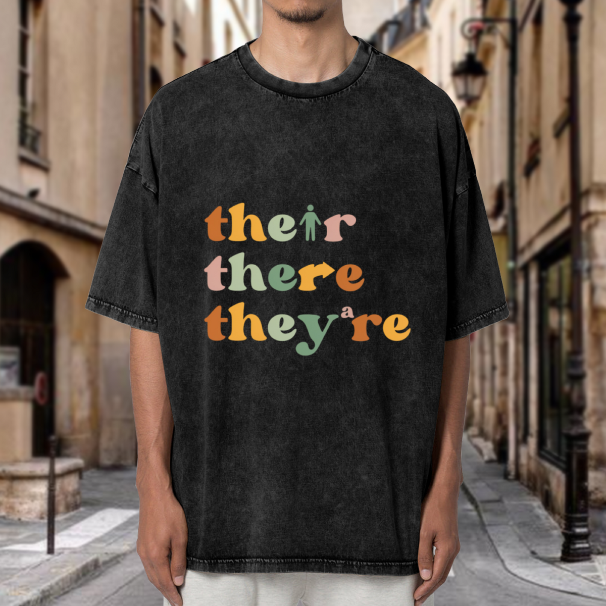Unisex washed graphic T-shirt with Their There They're themed design, product image