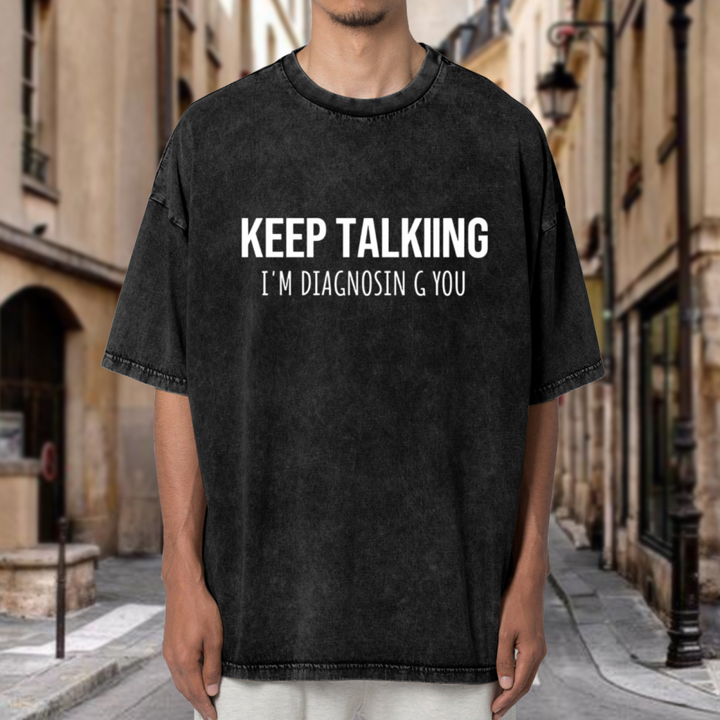 Product image of washed graphic T-shirt featuring 'Keep Talking I'm Diagnosing You Funny' statement design