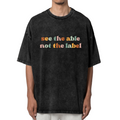 Unisex washed graphic T-shirt with See The Able Not The Label themed design, product image