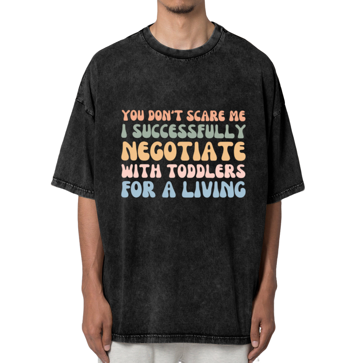 Unisex washed graphic T-shirt with You Don't Scare Me I Successfully Negotiate With Toddlers For A Living themed design, product image