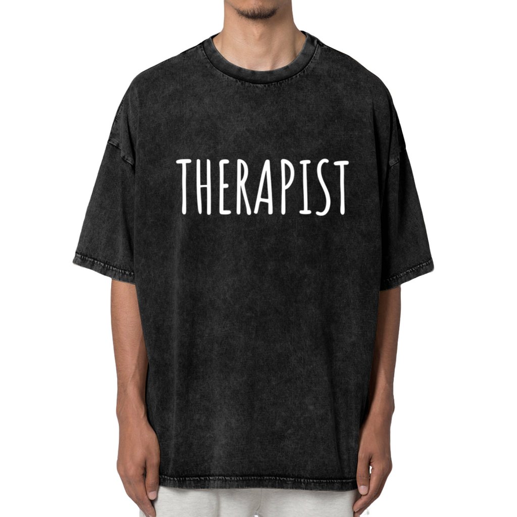 Product image of washed graphic T-shirt featuring 'Therapist Graphic' statement design