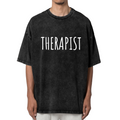 Product image of washed graphic T-shirt featuring 'Therapist Graphic' statement design