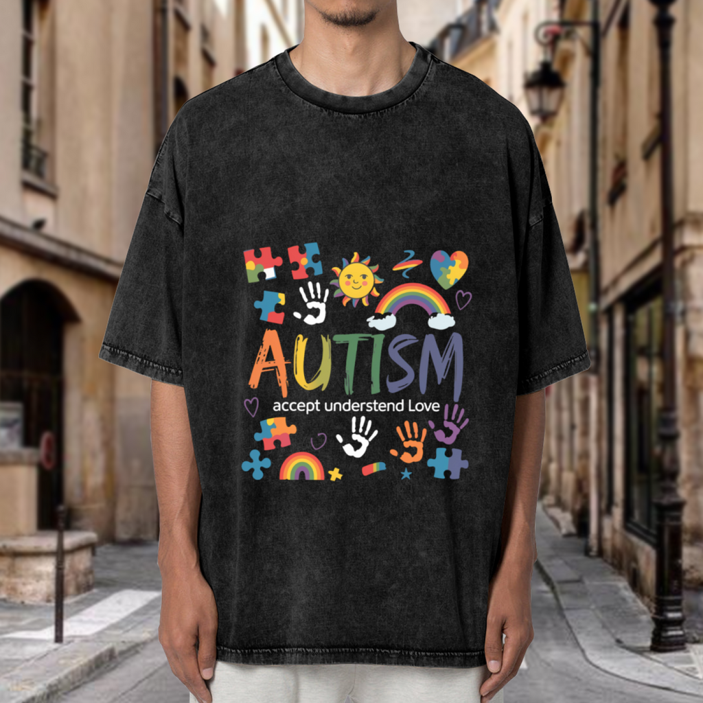Product image of washed graphic T-shirt featuring 'Autism Accept Love Understand' statement design