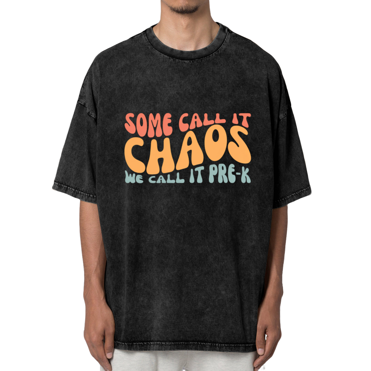 Unisex washed graphic T-shirt with Some Call It Chaos We Call It Pre-k themed design, product image