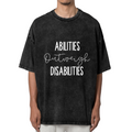 Unisex washed graphic T-shirt with Abilities Outweigh Disabilities themed design, product image