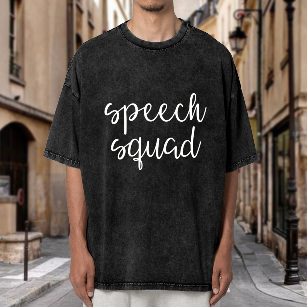 Product image of washed graphic T-shirt featuring 'Speech Therapist' statement design