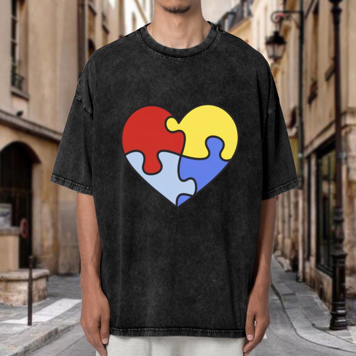 Product image of washed graphic T-shirt featuring 'Autism Awareness Graphic' statement design