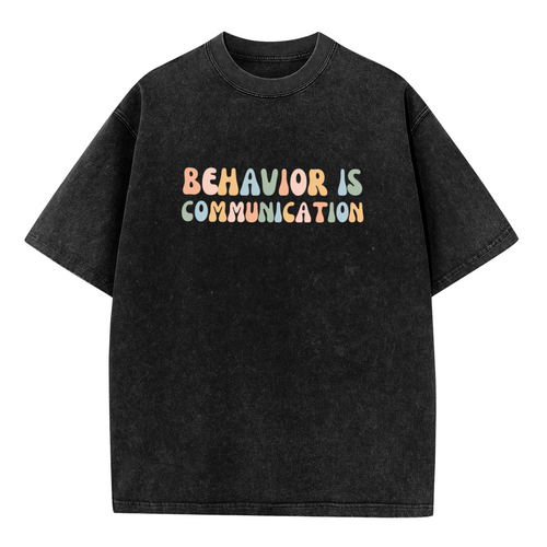 Unisex washed graphic T-shirt with Behavior Is Communication themed design, product image